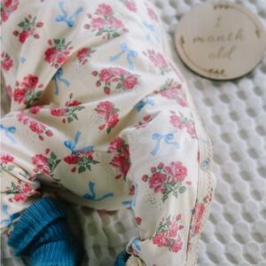 Konges Slojd Floral Bow Cream Baby Outdit with Pink Roses and Blue Ribbons